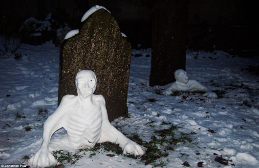 Awesome Zombie snowmen crawling out of the ground in Bristol